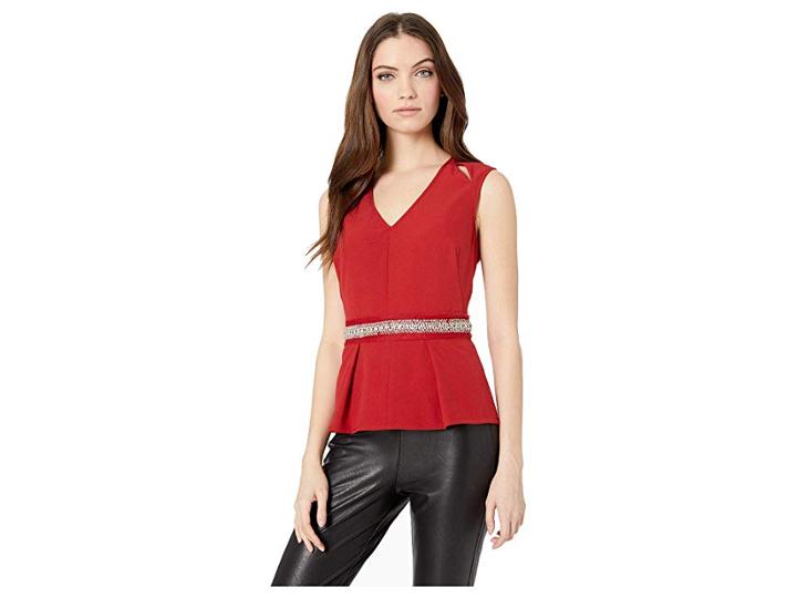Bebe Cut Out Detail Peplum Top (red Dahlia) Women's Blouse