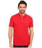 Lacoste Stretch Petit Pique Slim Fit Polo (red) Men's Short Sleeve Pullover