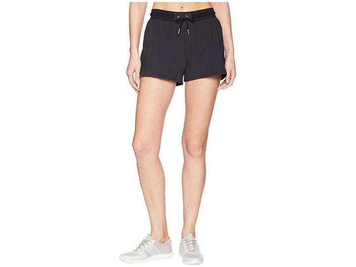 Asics Flex Woven Slit 4 Shorts (performance Black) Women's Shorts