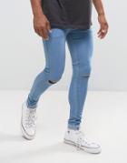 Criminal Damage Super Skinny Jeans With Knee Rips And Raw Hem - Blue