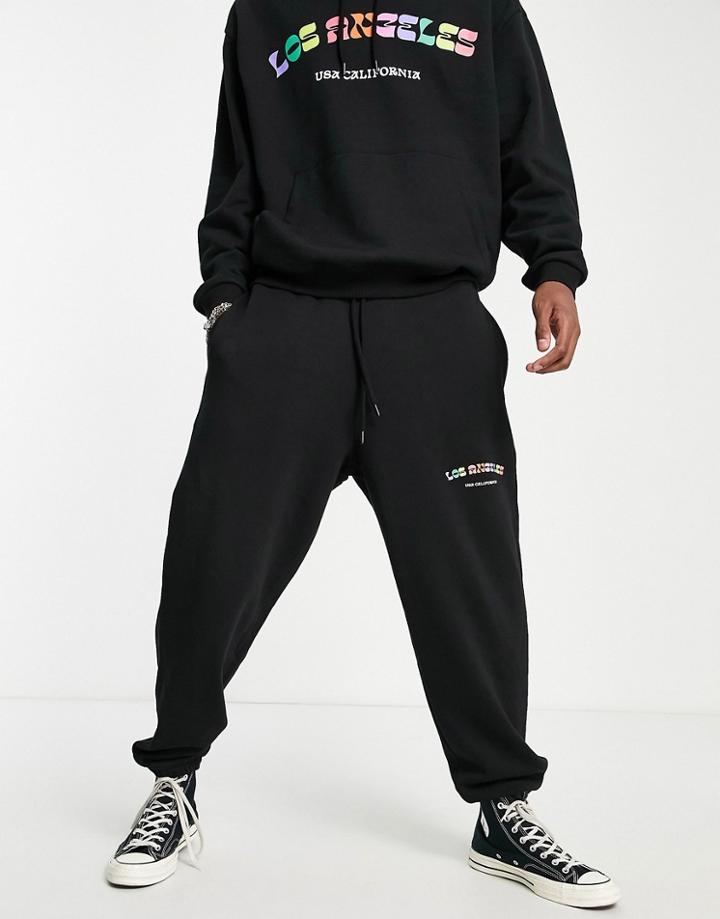 Asos Design Oversized Sweatpants In Black With Multicolor Los Angeles Print - Part Of A Set