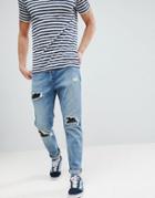 Asos Tapered Jeans In Mid Wash Vintage With Faux Leather Rip & Repair - Blue