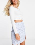 The Frolic Ditsy Floral Mini Skirt In Pale Blue