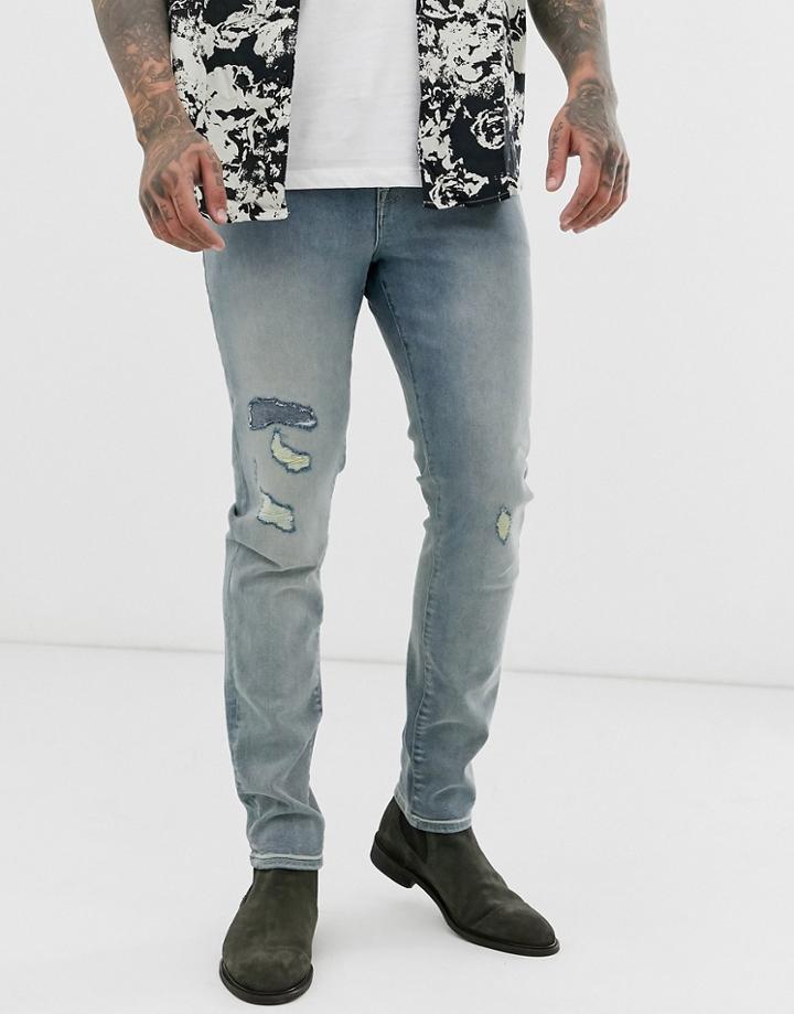 Asos Design 12.5oz Skinny Jeans In Smokey Mid Wash Blue With Rip And Repair