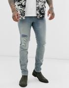 Asos Design 12.5oz Skinny Jeans In Smokey Mid Wash Blue With Rip And Repair