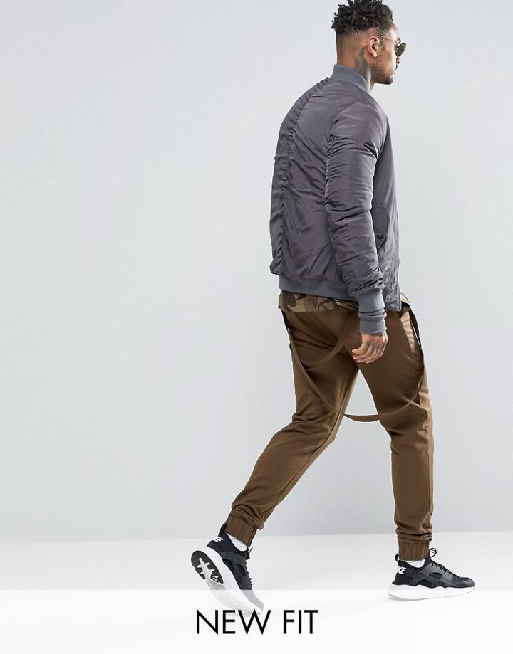 Asos Skinny Joggers With Rear Taping Detail And Woven Pockets In Khaki - Green