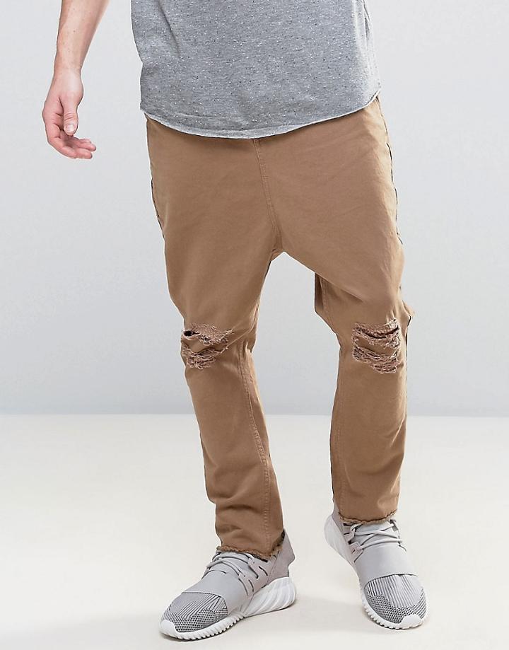 Asos Drop Crotch Chinos With Rips And Raw Hem In Stone - Green