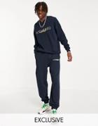 Reclaimed Vintage Inspired 90s Sweatpants With Logo Embroidery-navy