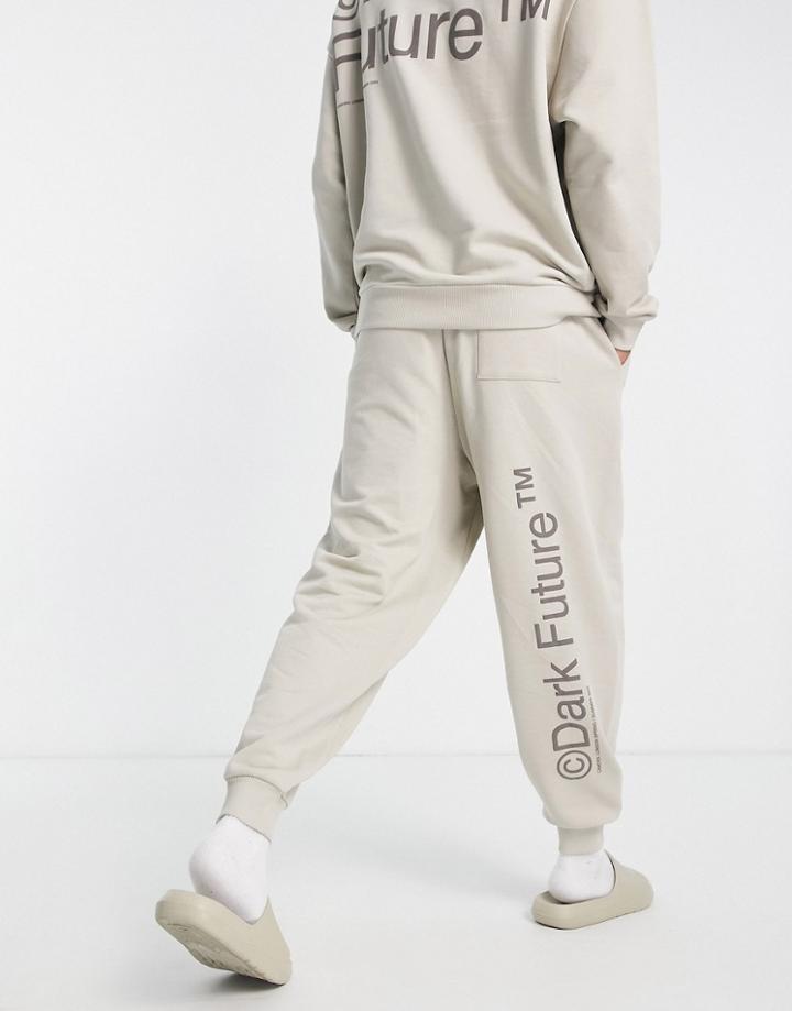 Asos Dark Future Relaxed Sweatpants With Multi Puff Prints And Woven Label In Neutral - Part Of A Set