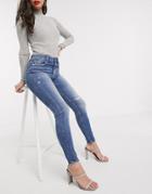 Stradivarius Super High Waist Skinny Jeans In With Rip In Medium Blue-blues