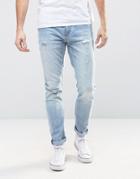 Rollas Thin Captain Slim Fit Jean Rip And Repair Bush Fire Blue Wash -