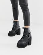 Demonia Assault Chunky Harness Boots In Black