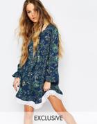 Reclaimed Vintage Long Sleeve Tunic Dress With Tie Back Detail In Paisley Floral - Blue