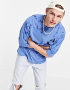 Asos Design Oversized T-shirt In Blue Organic Cotton Tie Dye With Graffiti Print-blues