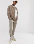 Asos Design Oversized Long Sleeve T-shirt With Turtleneck And Woven Utility Pockets In Beige-blue
