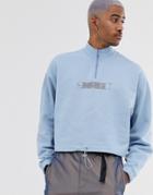 Asos Design Oversized Crop Sweatshirt In Pale Blue With Nrg Print - Blue