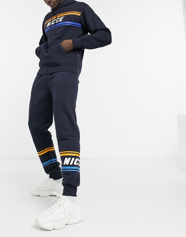 Nicce Border Stripe Logo Sweatpants In Navy