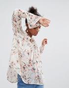 Crescent Floral Print Bell Sleeve Blouse With Front Smocking Detail - Cream
