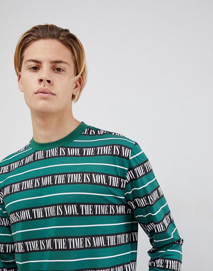 Asos Design Relaxed Longline Long Sleeve T-shirt With Text All Over Print - Green