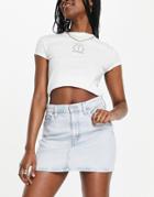Levi's 70s High Rise Mini Skirt In Ligh Wash Blue