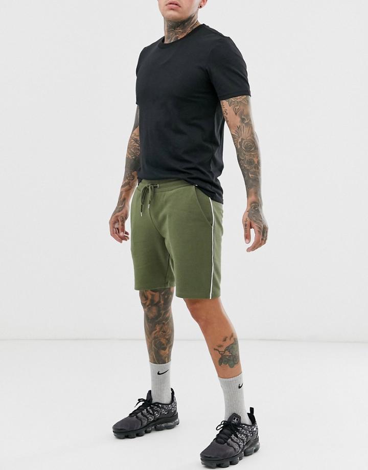 Asos Design Jersey Skinny Shorts With Piping In Khaki