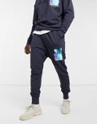Asos Design Tapered Sweatpants In Navy With Flower Print - Part Of A Set