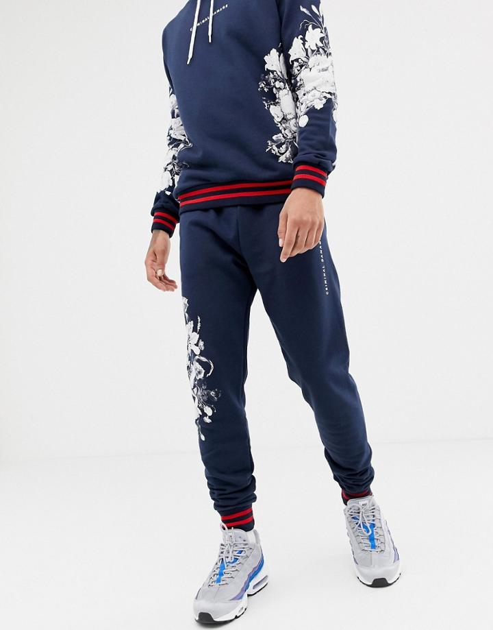 Criminal Damage Skinny Sweatpants In Navy With Floral Detail