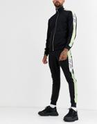 Asos Design Two-piece Skinny Sweatpants In Polytricot In Black With Dark Future Logo & Mint Side Stripe