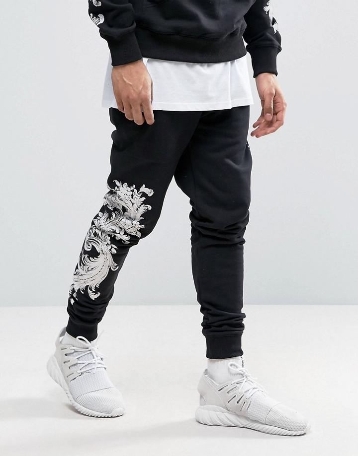 Criminal Damage Skinny Joggers In Black With Baroque Print - Black