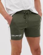 Asos Design Jersey Skinny Shorts In Shorter Length In Khaki With Side Stripe & Text Print - Green