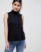 Asos Design Sleeveless Top With Roll Neck In Black - Black