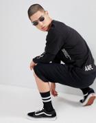 Aape By A Bathing Ape Long Sleeve Layered T-shirt With Sleeve Print In Black - Black