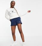 Asos Design Tall Tracksuit Sweat / Roll Waist Sweat Short With Riviera Graphic In Navy/cream-multi