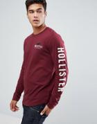 Hollister Long Sleeve Top Tech Logo Sleeve Print In Burgundy - Red