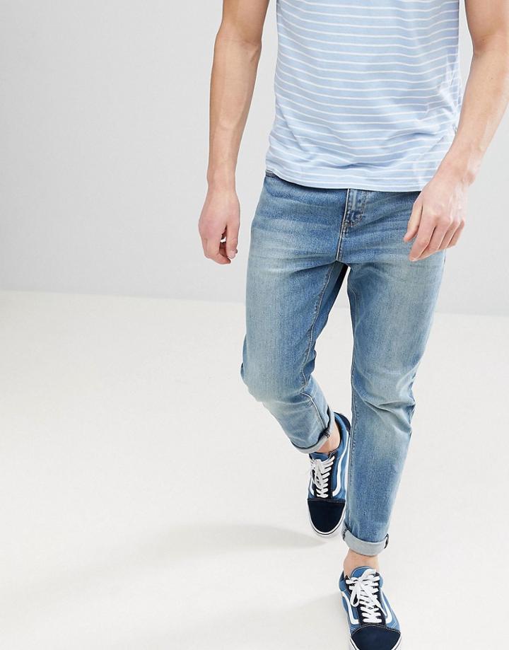 Asos Design Tapered Jeans In Mid Wash-blue