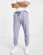 Asos Design Tapered Sweatpants With Pin Tuck In Purple