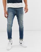 Asos Design Recycled 12.5oz Super Skinny Jeans In Smokey Washed Blue With Rip And Repair - Blue