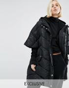 Puffa Oversized Cape Jacket With Padded Collar And Hood In Tonal Leopard - Black