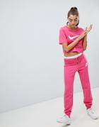 Nike Rally Pink Swoosh Logo Slim Fit Sweatpants