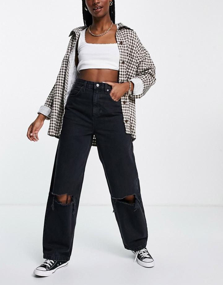 Topshop Baggy Jeans With Rips In Washed Black