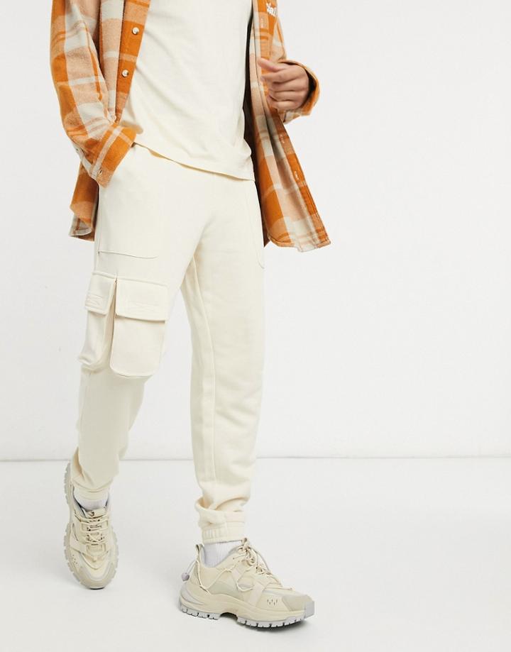Asos Design Tapered Sweatpants With Multi Utility Pockets & Velcro Tab Cuffs In Off-white-neutral