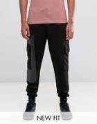 Asos Tapered Joggers With Cargo Pockets And Printed Panels - Black