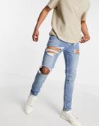 Asos Design Skinny Jeans With Rips And Destroyed Hem In Vintage Mid Wash Blue-blues