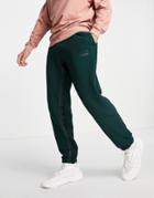 Adidas Originals Ryv Sweatpants In Dark Green-black