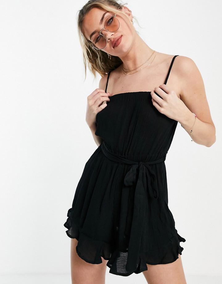 Asos Design Crinkle Frill Hem Tie Waist Romper In Black