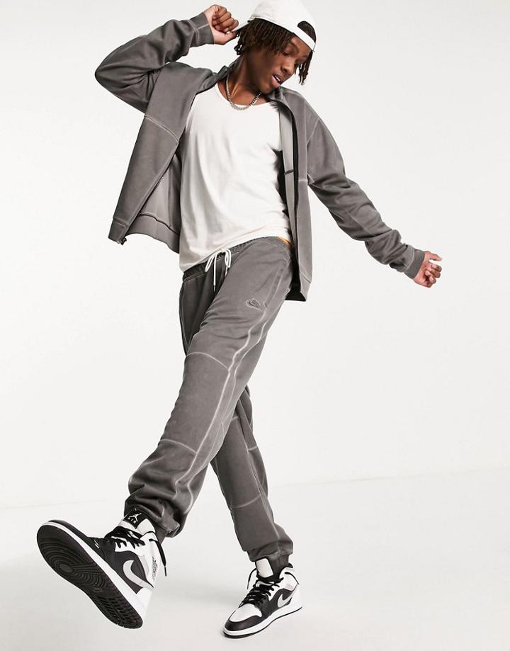 Nike Revival Washed Cuffed Sweatpants In Black