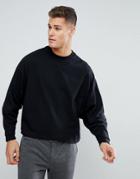 Asos Oversized Long Sleeve T-shirt With Extreme Batwing In Cropped Length In Black - Black