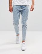 Asos Tapered Jeans In Bleach Wash With Abrasions - Blue