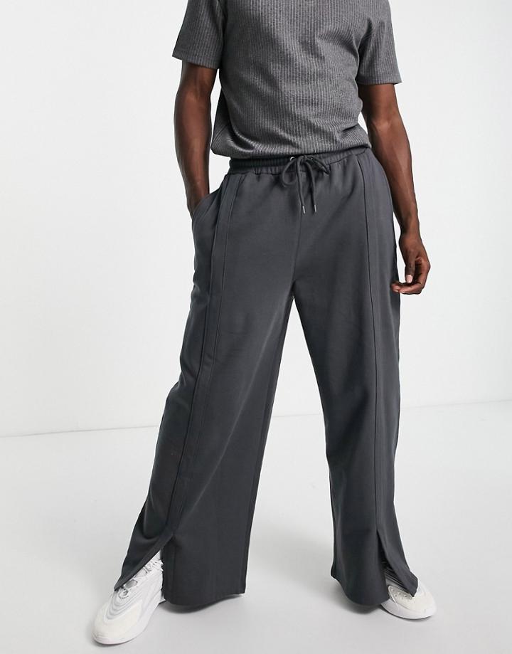 Asos Design Oversized Wide Leg Sweatpants With Front Split In Washed Black