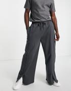 Asos Design Oversized Wide Leg Sweatpants With Front Split In Washed Black